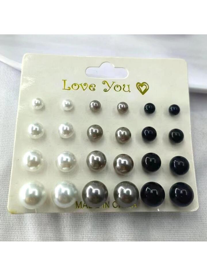 ARETES PERLAS BLANCO Y NEGRO